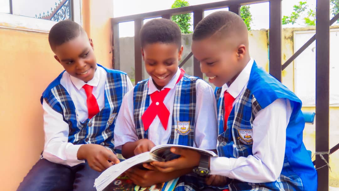 High school students reading a textbook